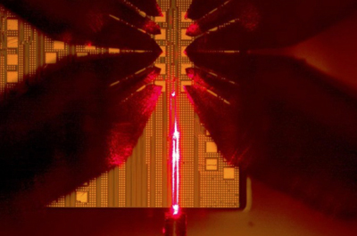 Die-level edge-coupling based electro-optic measurements.