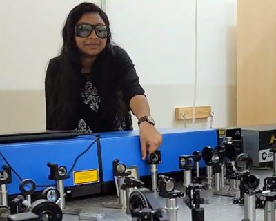 Lead author Jyothsna KM aligning optical beams for up-conversion.