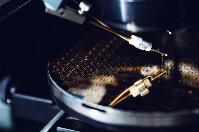 Kudos for Kubos: A 150-mm wafer of GaN LEDs under test via wafer probing.