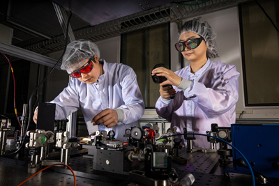 Tong Zhou and Siyun Chen working on the spectral combining method.