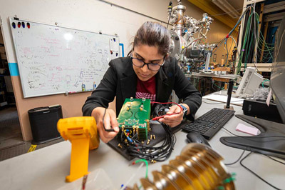 Kaushalya Jhuria in the lab testing the experimental setup.