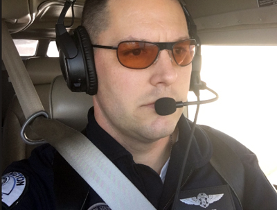 Flt Off'r Cameron Iverson of Washington State Patrol tests CALI protective lenses.